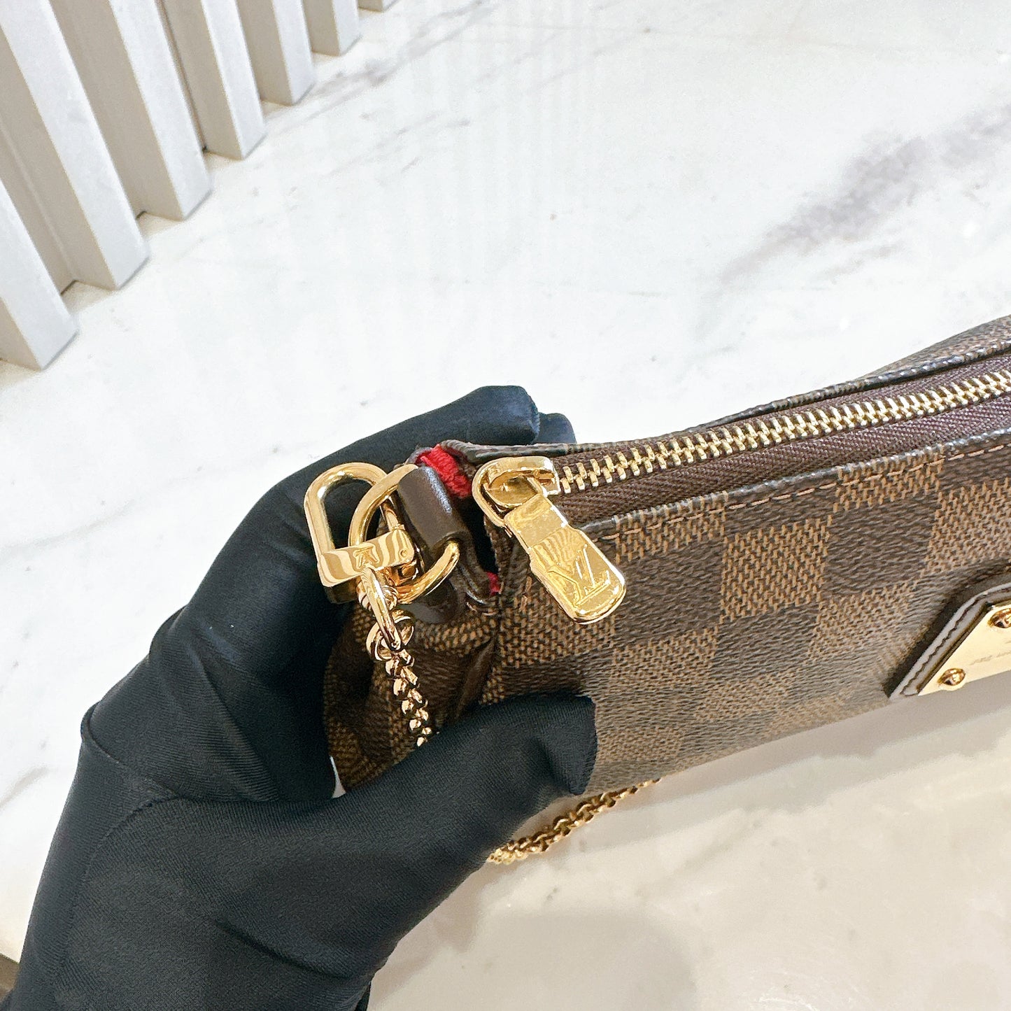 LV Damier Ebene Eva Clutch