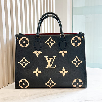 LV On The Go MM in Black and Creme