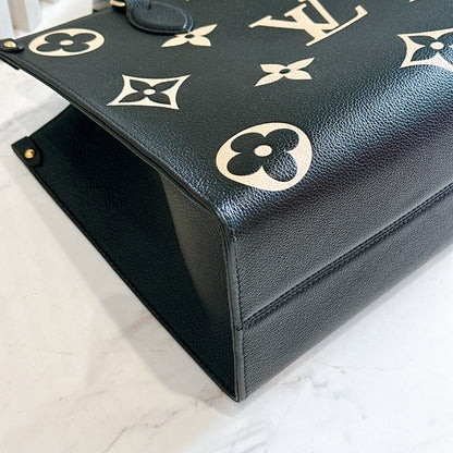 LV On The Go MM in Black and Creme