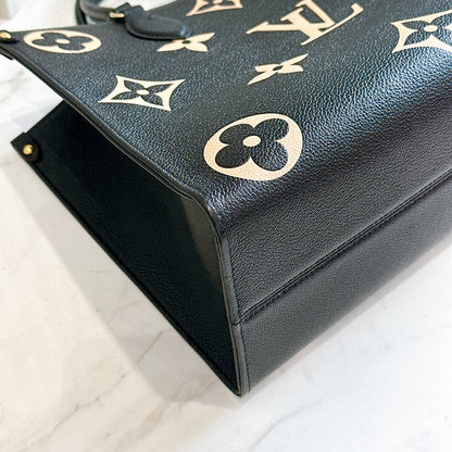 LV On The Go MM in Black and Creme