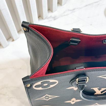 LV On The Go MM in Black and Creme