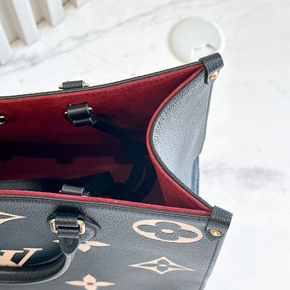 LV On The Go MM in Black and Creme