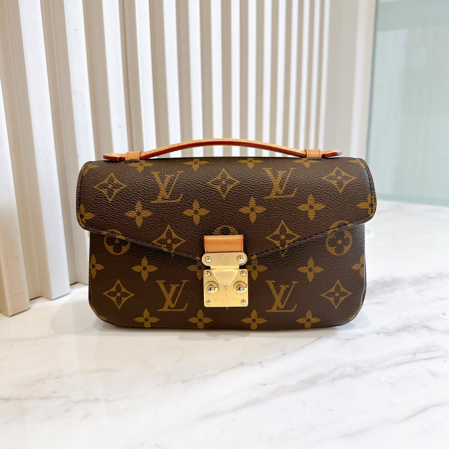 LV Monogram Metis East West