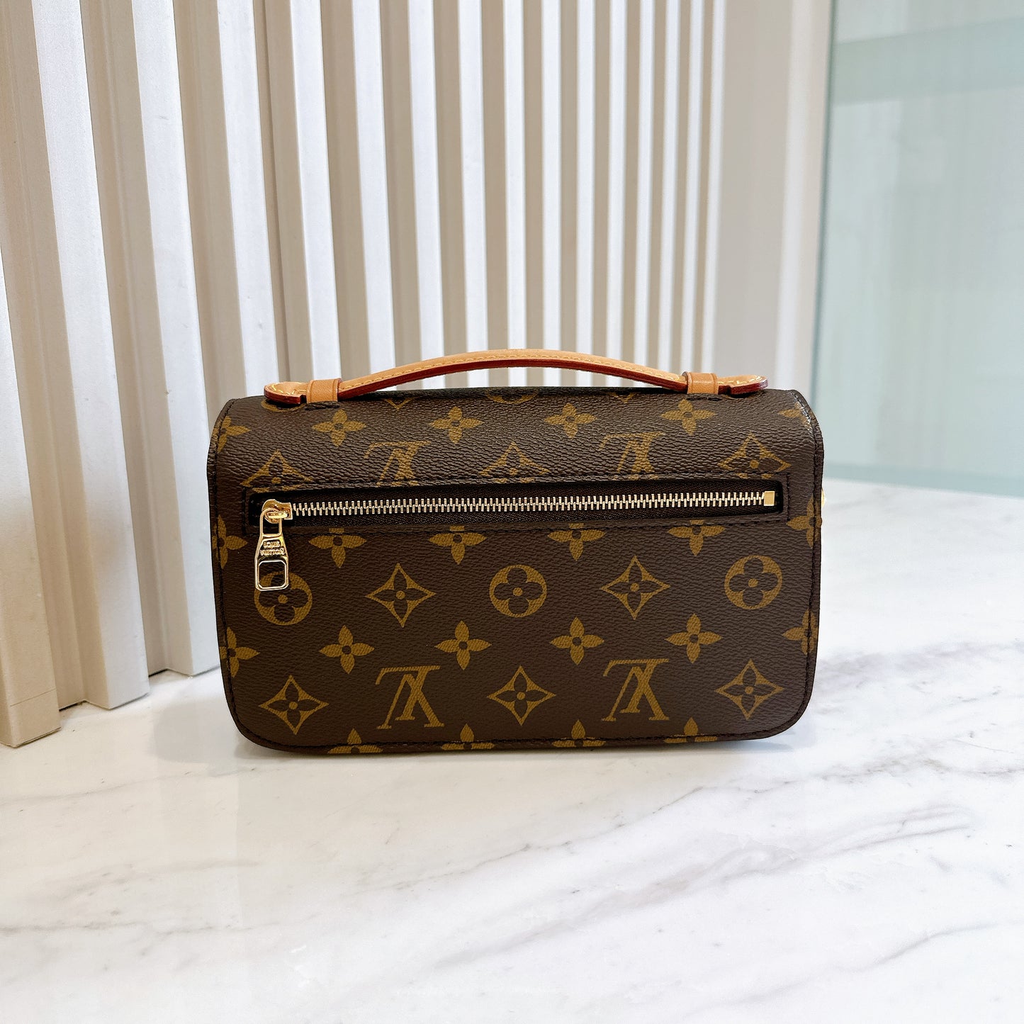 LV Monogram Metis East West