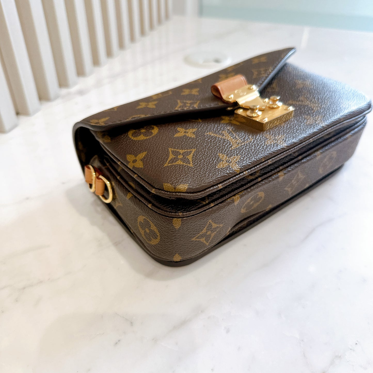 LV Monogram Metis East West