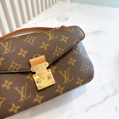 LV Monogram Metis East West