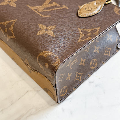 LV On The Go PM in Reverse Monogram