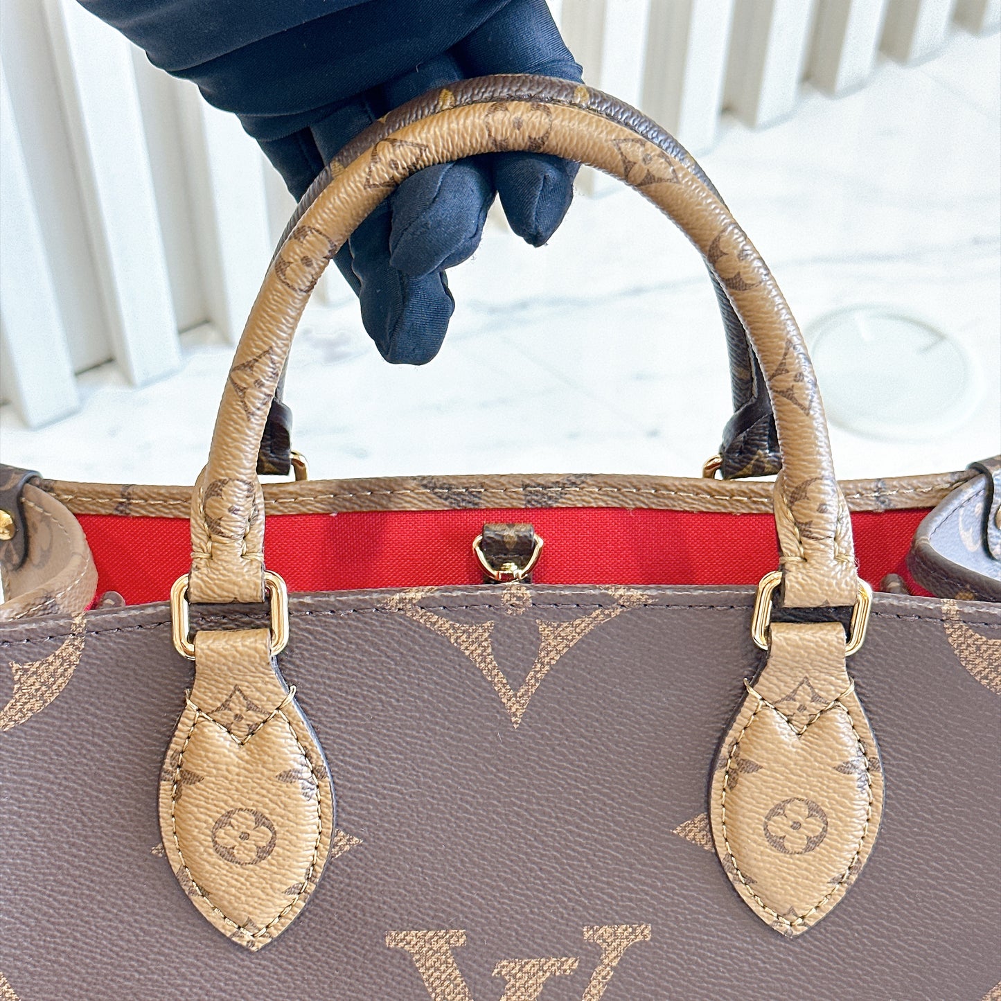 LV On The Go PM in Reverse Monogram