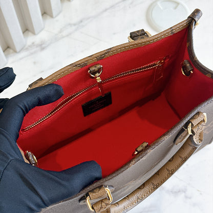 LV On The Go PM in Reverse Monogram