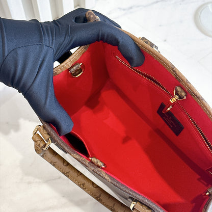 LV On The Go PM in Reverse Monogram