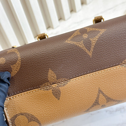 LV On The Go PM in Reverse Monogram