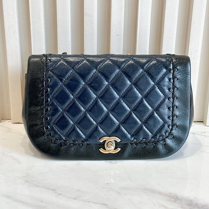 Chanel CC Braided Saddle Flap in Quilted Lambskin