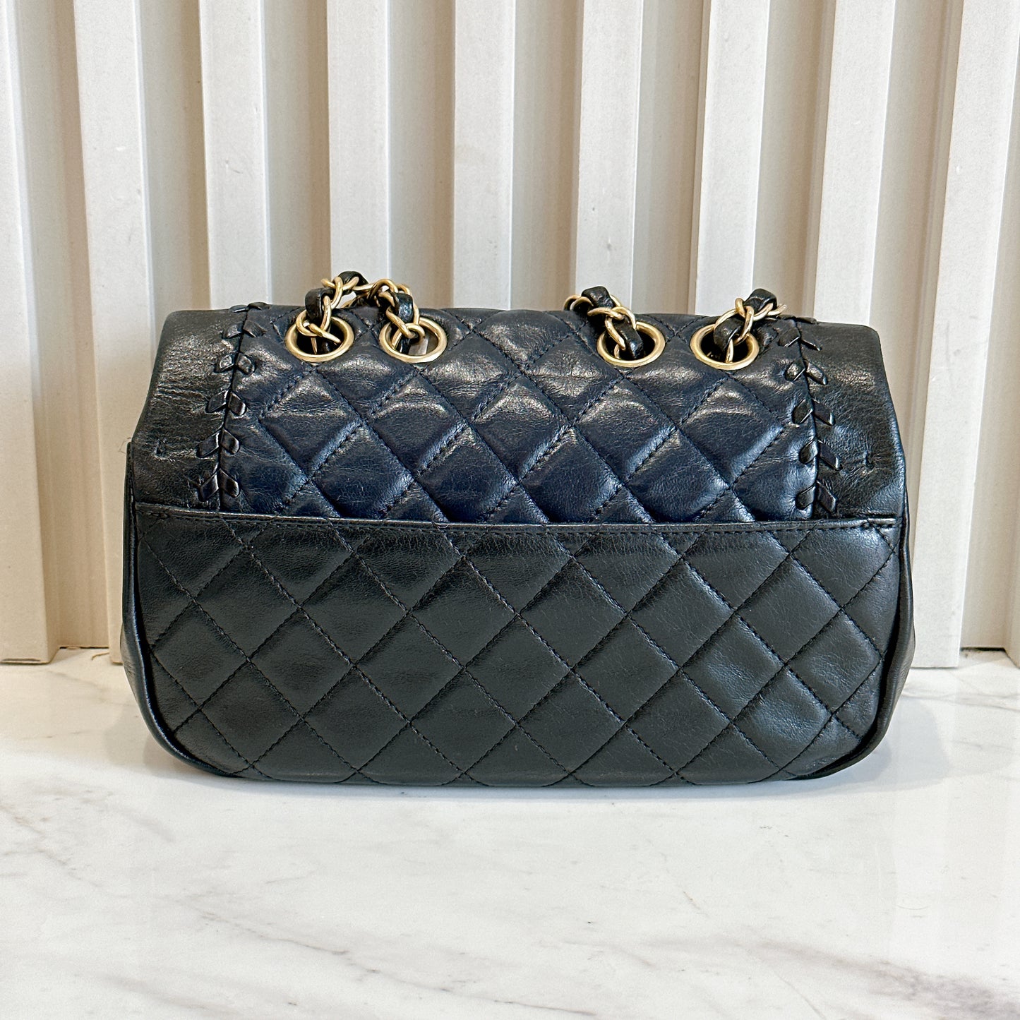 Chanel CC Braided Saddle Flap in Quilted Lambskin