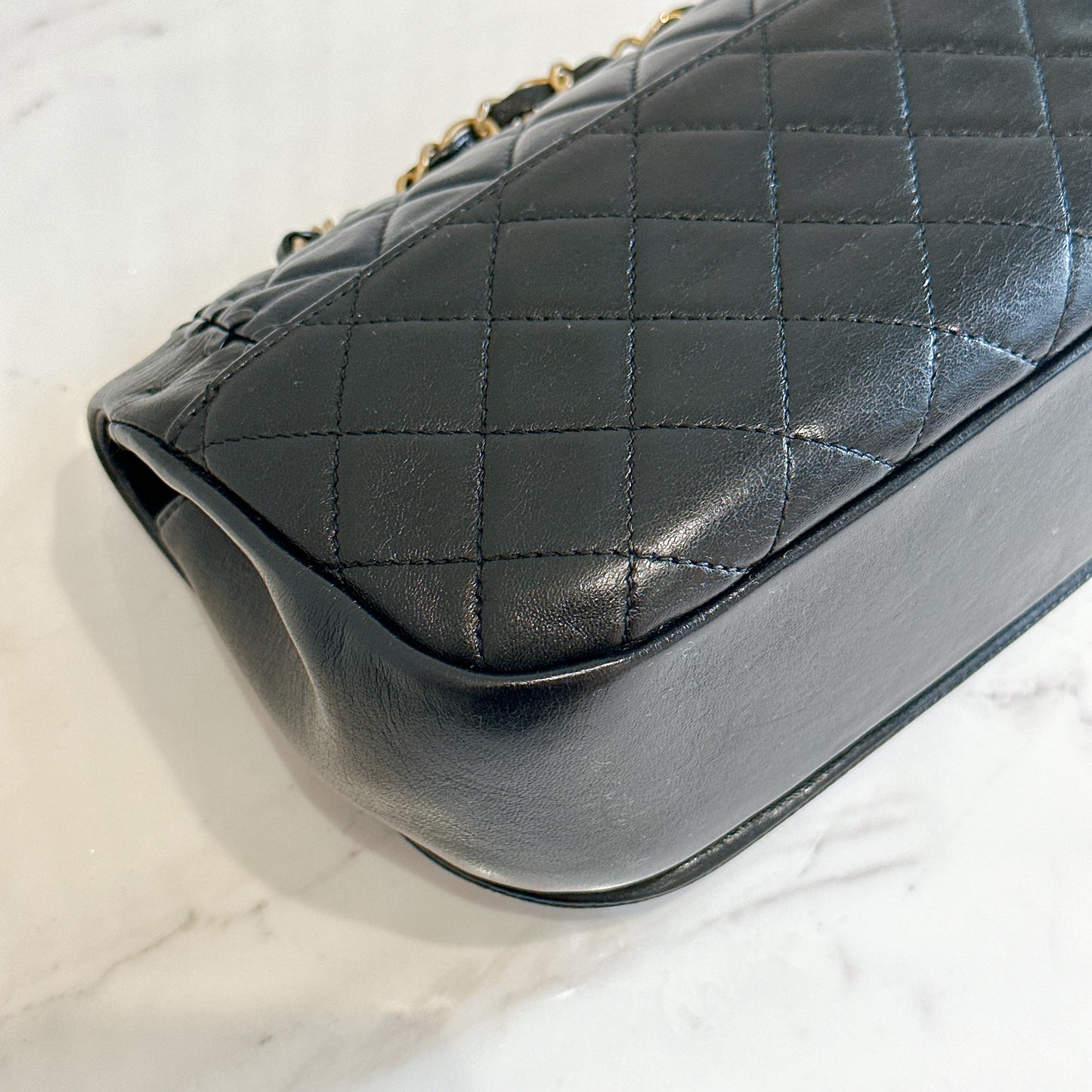 Chanel CC Braided Saddle Flap in Quilted Lambskin
