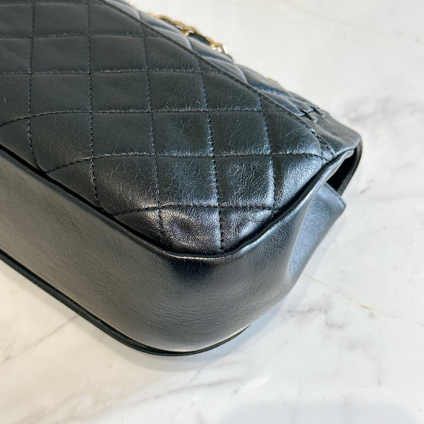 Chanel CC Braided Saddle Flap in Quilted Lambskin