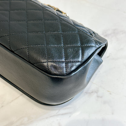 Chanel CC Braided Saddle Flap in Quilted Lambskin