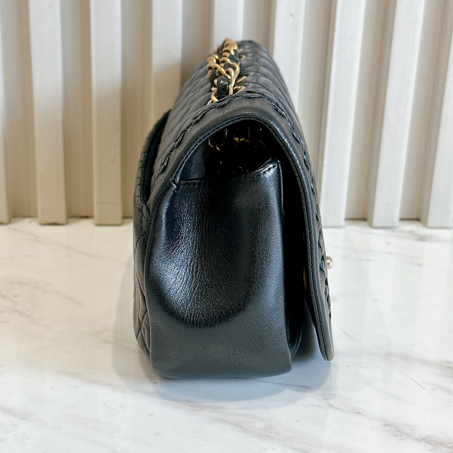 Chanel CC Braided Saddle Flap in Quilted Lambskin