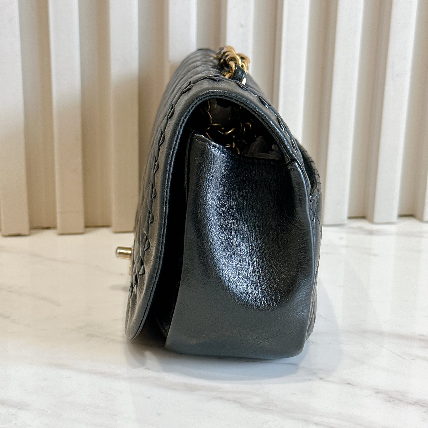 Chanel CC Braided Saddle Flap in Quilted Lambskin