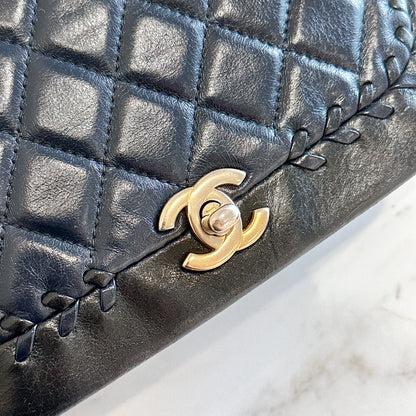 Chanel CC Braided Saddle Flap in Quilted Lambskin