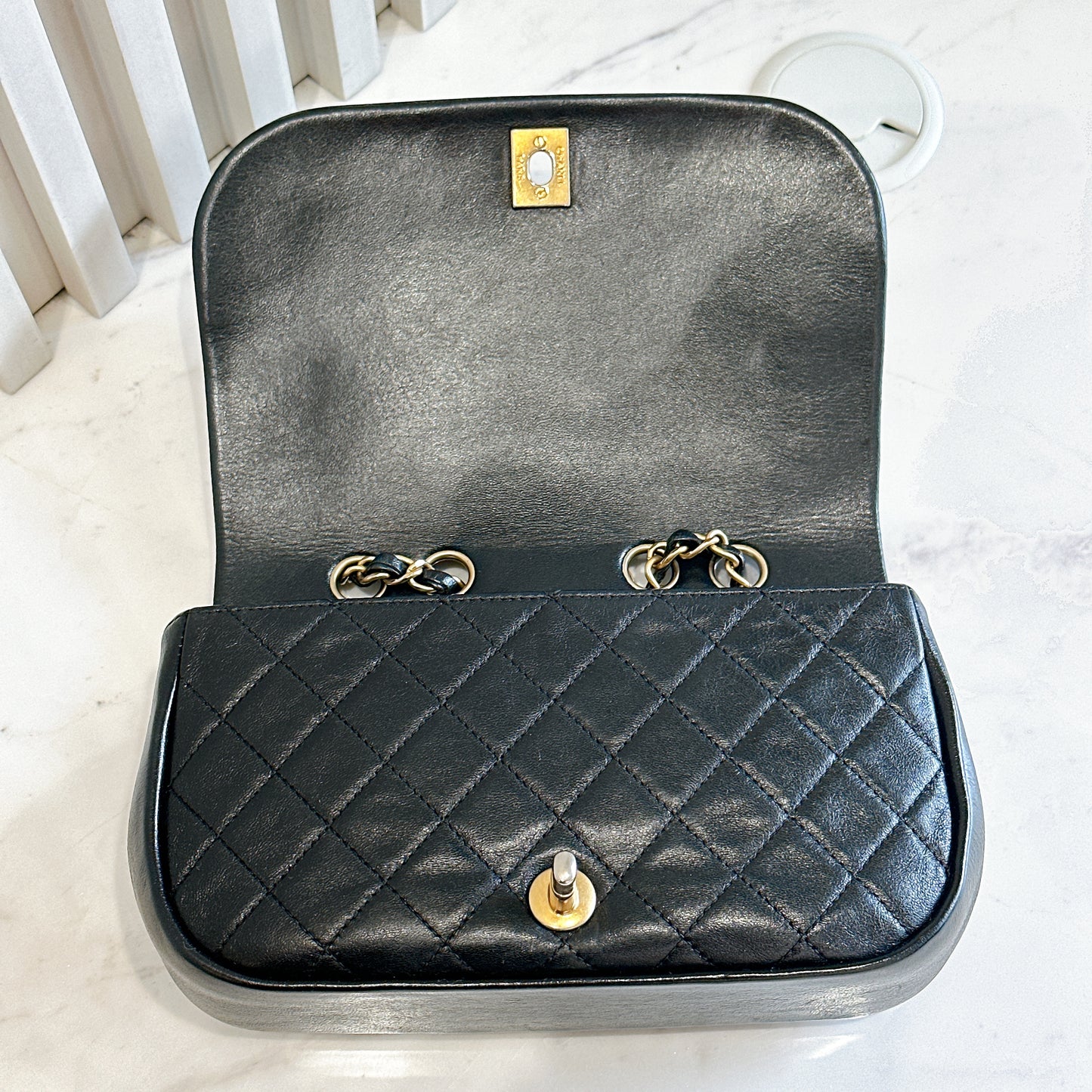 Chanel CC Braided Saddle Flap in Quilted Lambskin