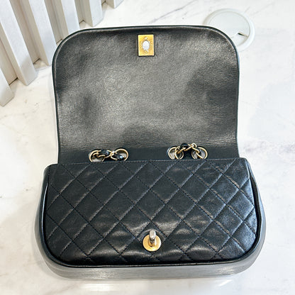 Chanel CC Braided Saddle Flap in Quilted Lambskin