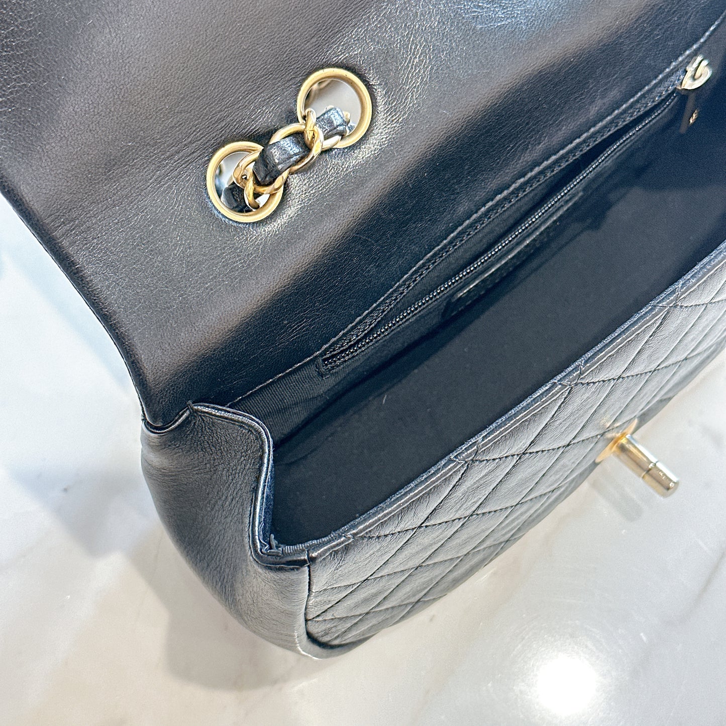 Chanel CC Braided Saddle Flap in Quilted Lambskin
