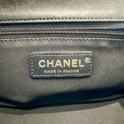 Chanel CC Braided Saddle Flap in Quilted Lambskin