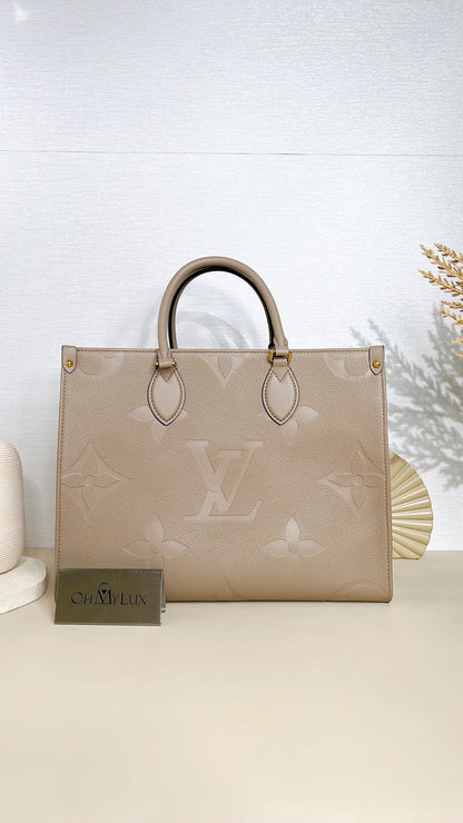 LV On The GO MM in Tourterelle Empreinte Leather