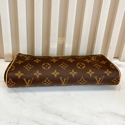LV Monogram Eva Clutch