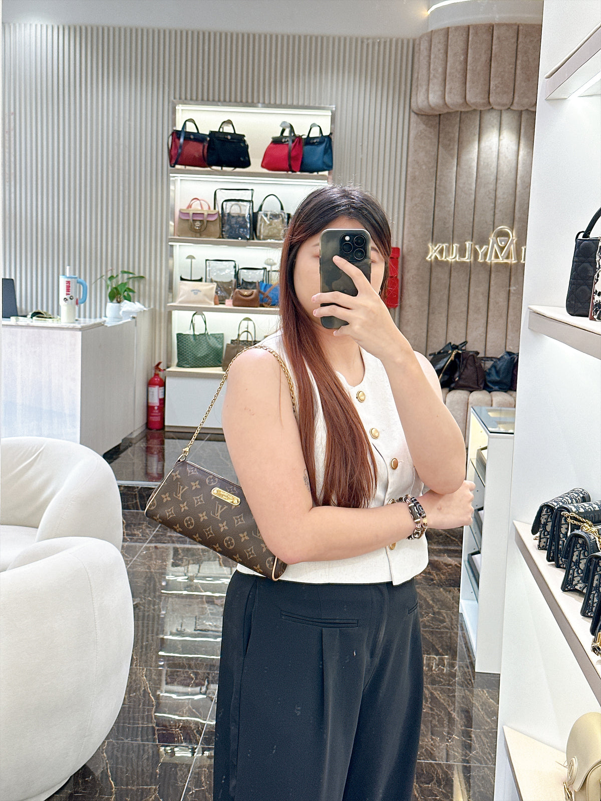 LV Monogram Eva Clutch