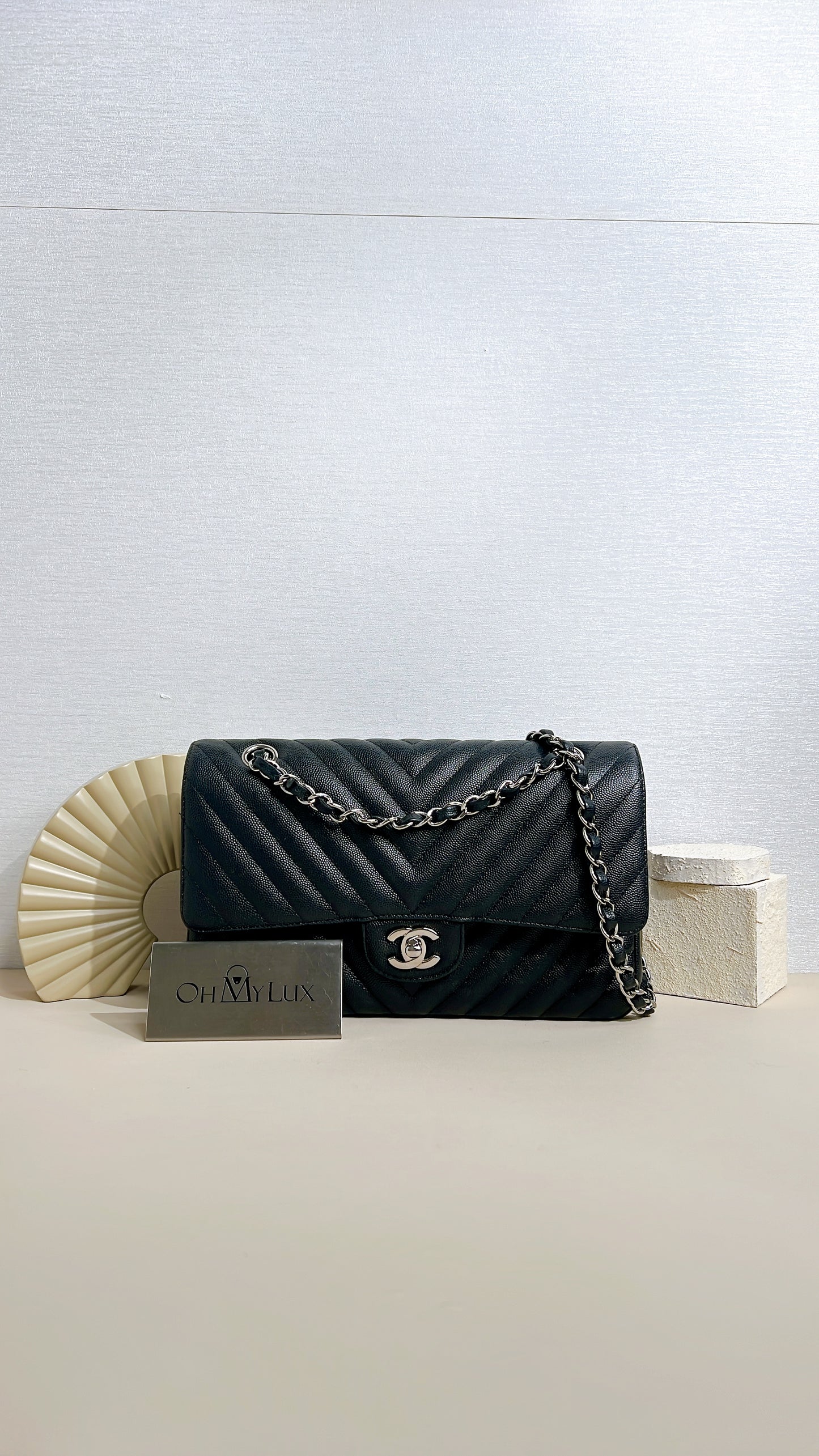 Chanel Classic Flap Medium in Black Chevron Caviar Leather
