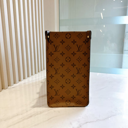 LV On The Go MM in Reverse Monogram