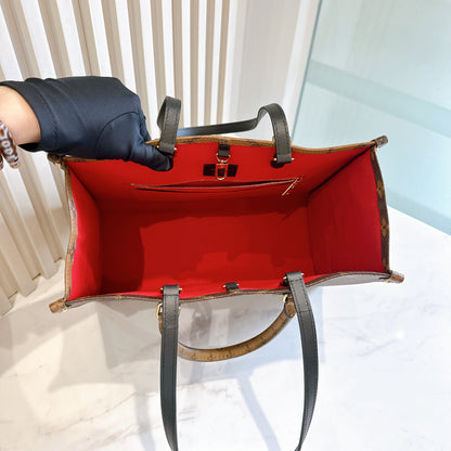 LV On The Go MM in Reverse Monogram