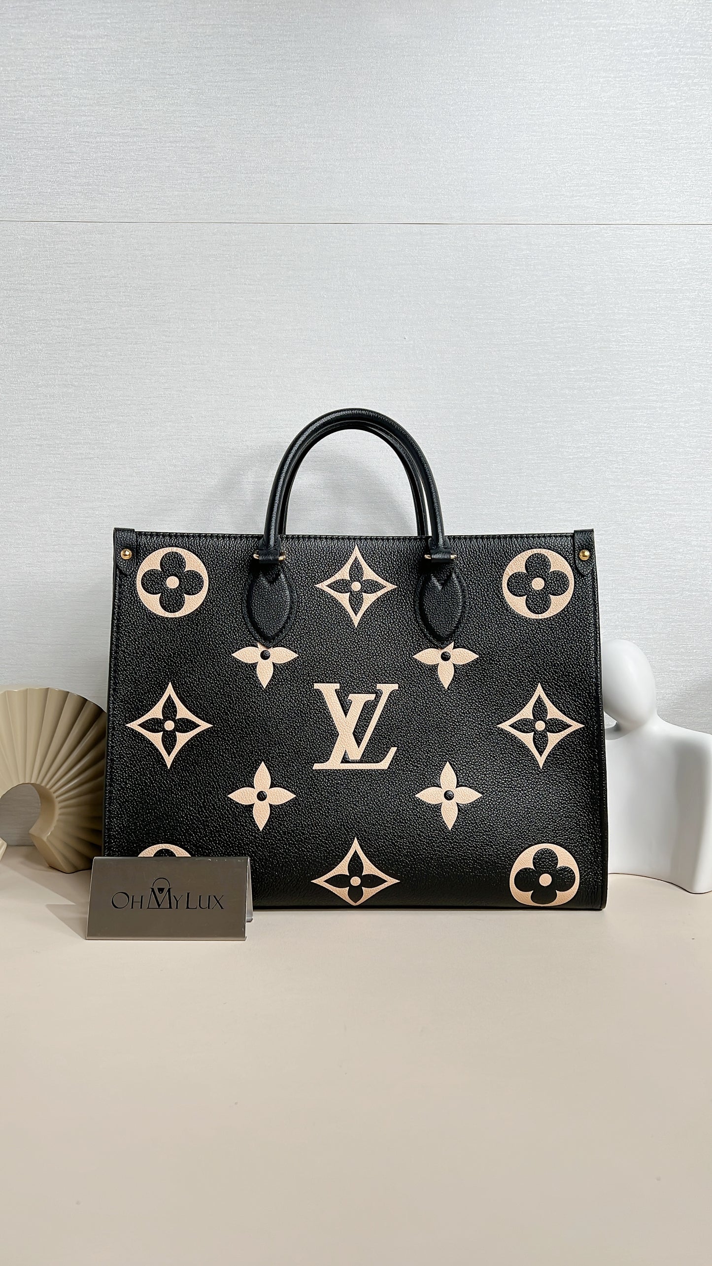 LV On The Go MM in Black and Creme