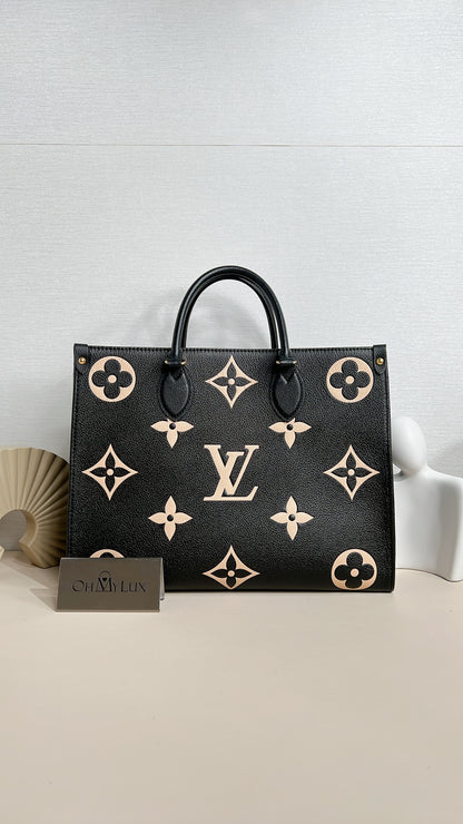 LV On The Go MM in Black and Creme
