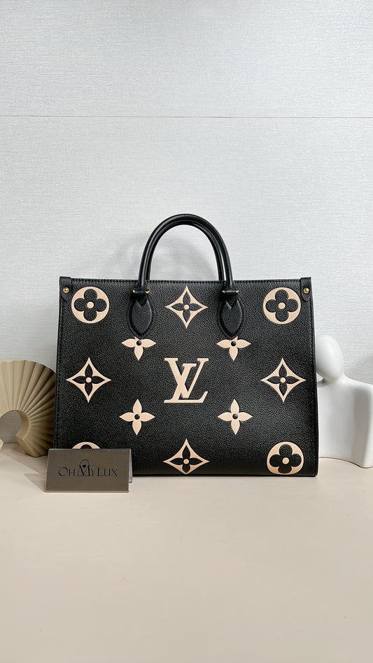 LV On The Go MM in Black and Creme