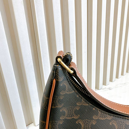 Celine Ava in Tan Triomphe Canvas