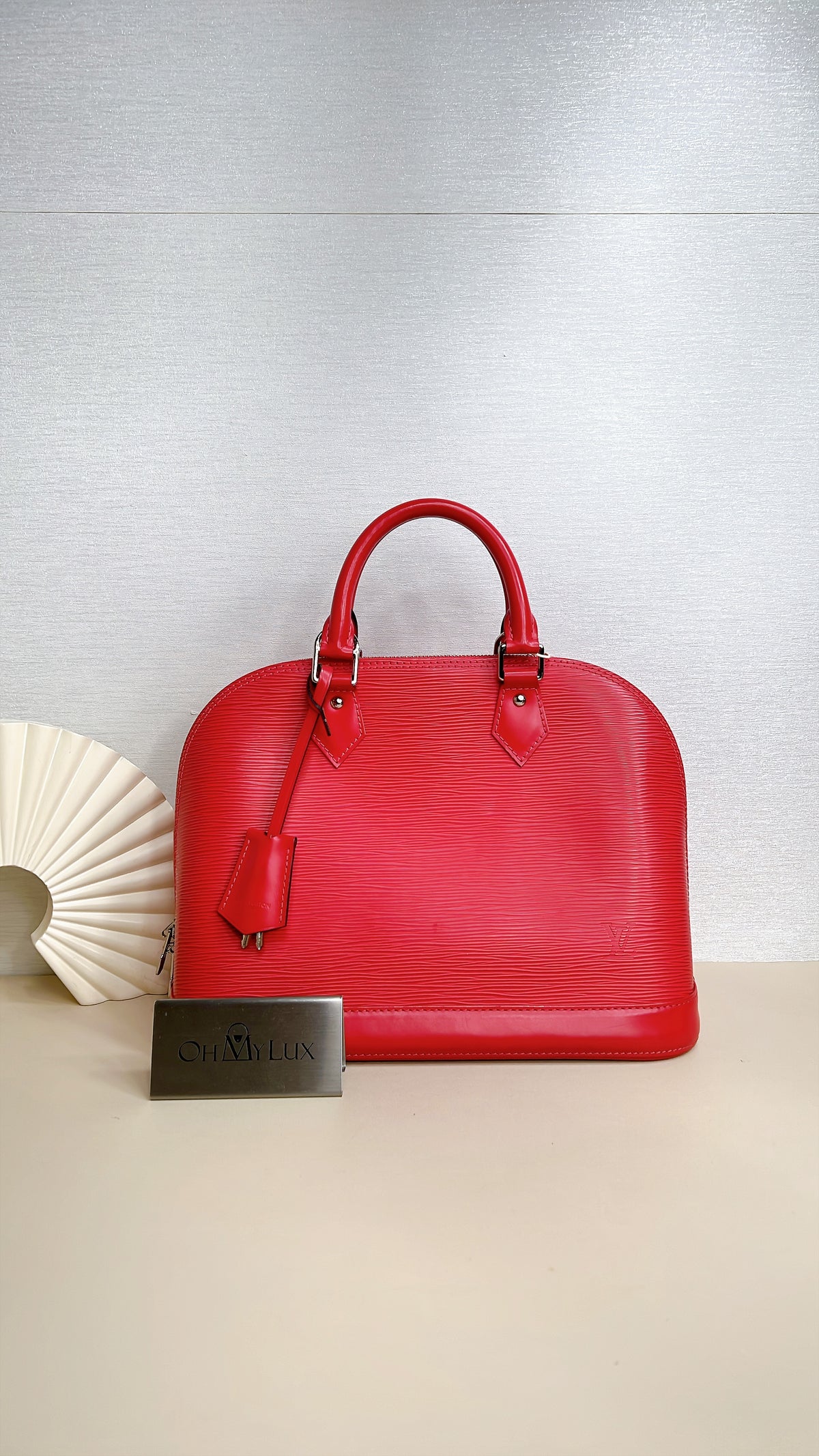 LV Alma PM in Pink Epi Leather