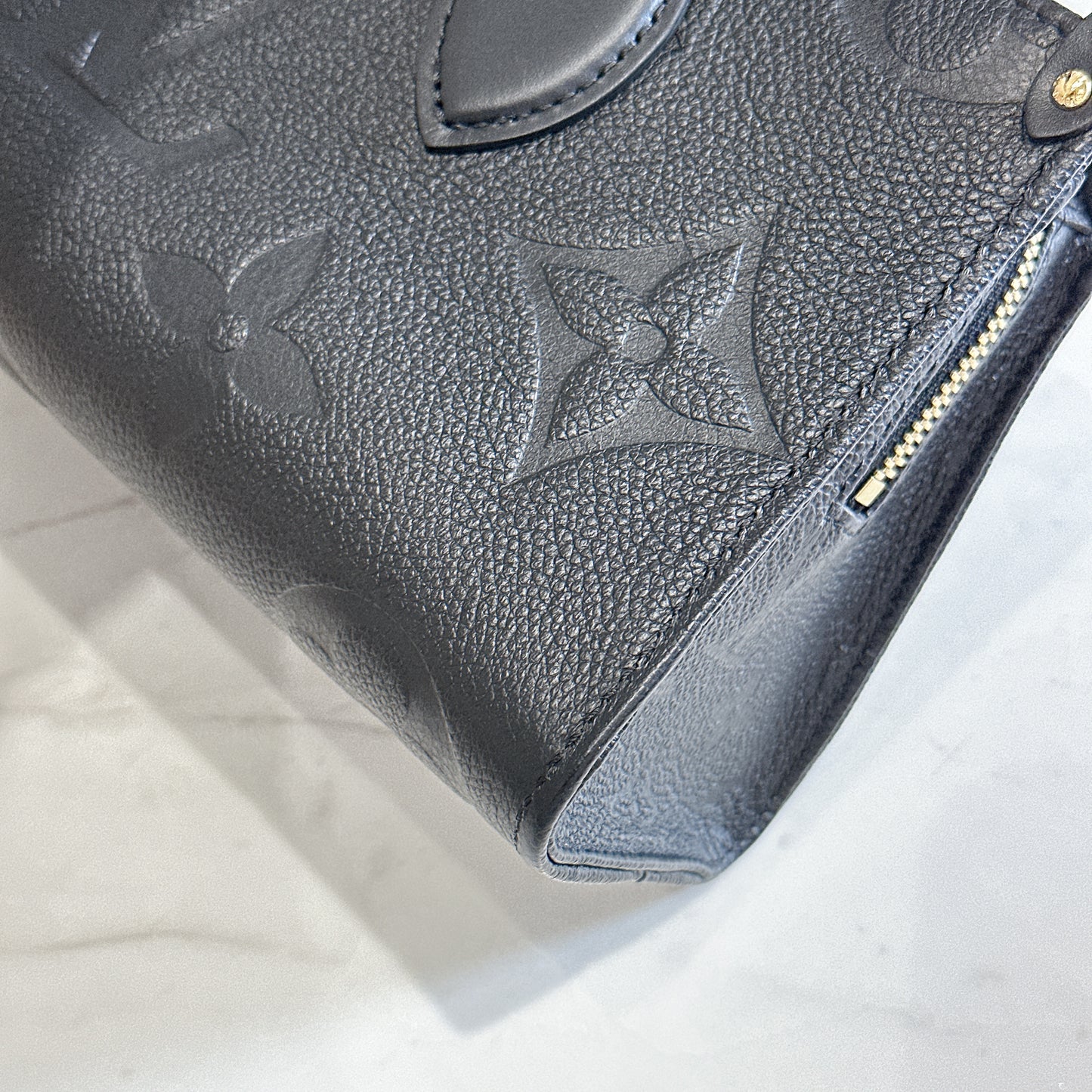 LV On the Go East West in Empriente Leather Black