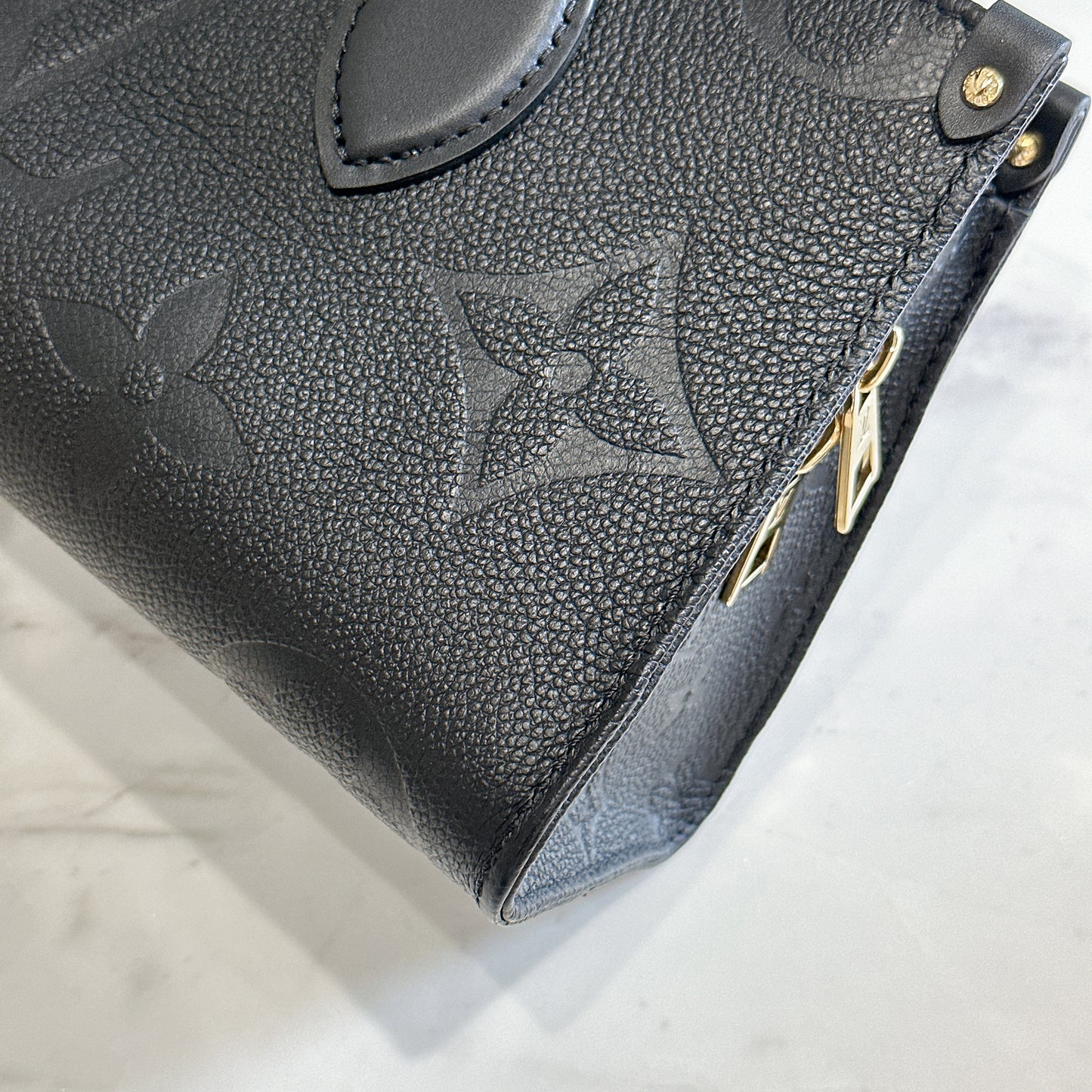 LV On the Go East West in Empriente Leather Black