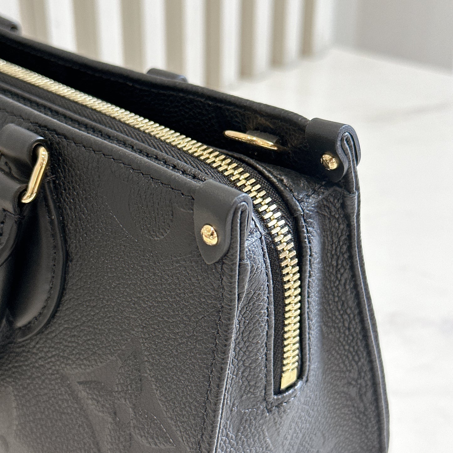 LV On the Go East West in Empriente Leather Black