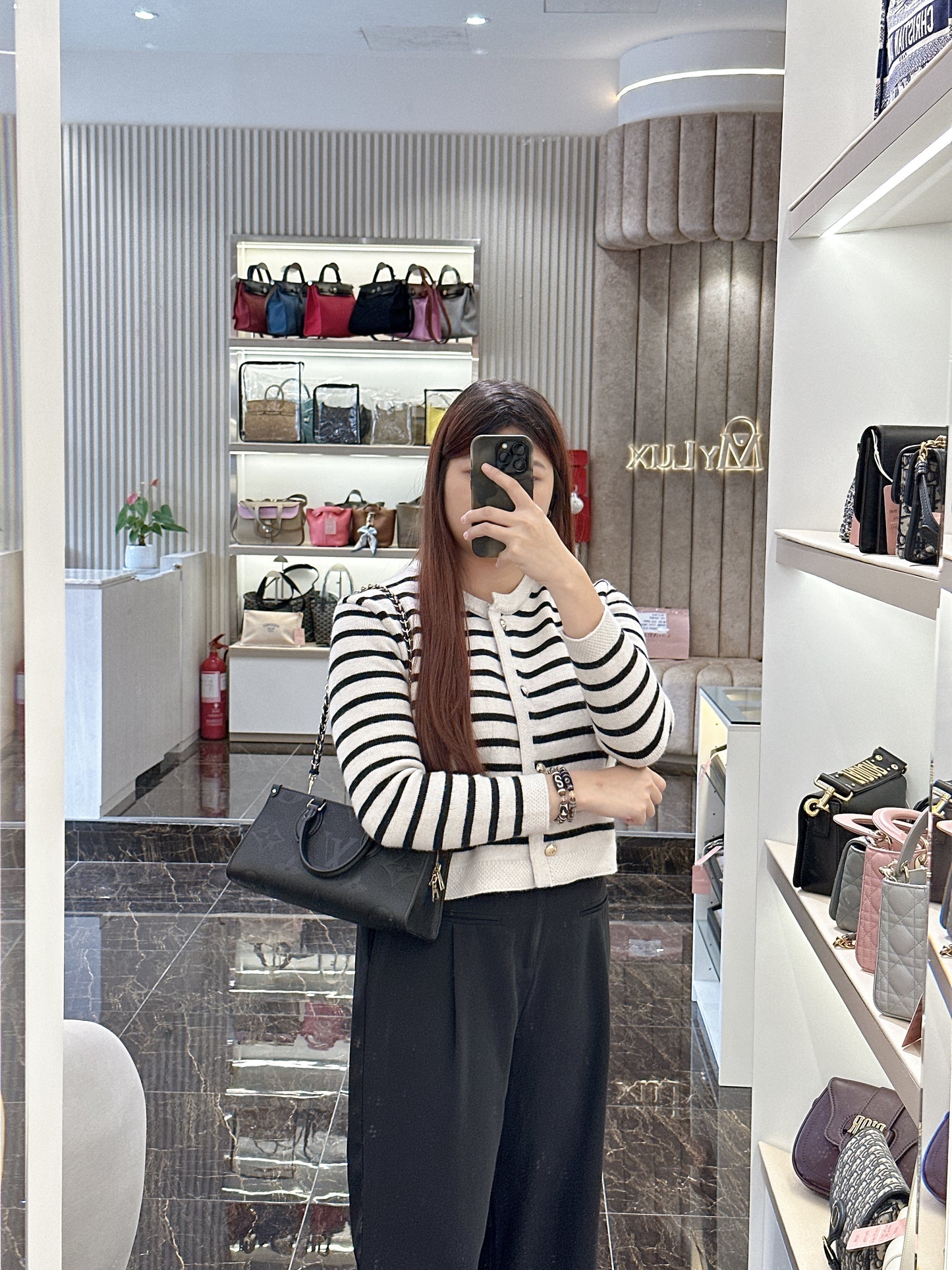 LV On the Go East West in Empriente Leather Black
