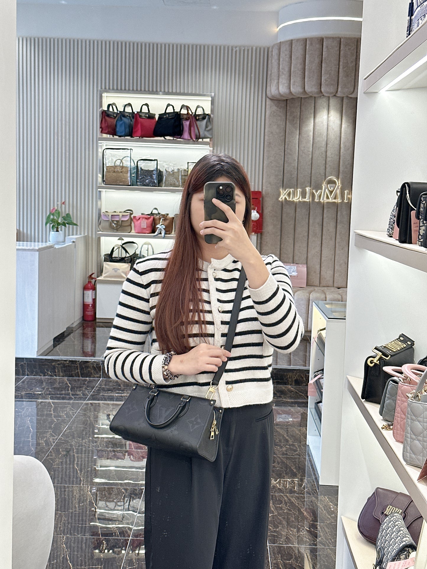 LV On the Go East West in Empriente Leather Black