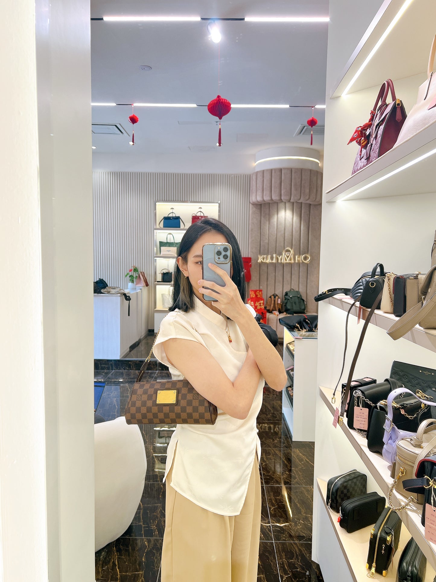 LV Damier Ebene Eva Clutch
