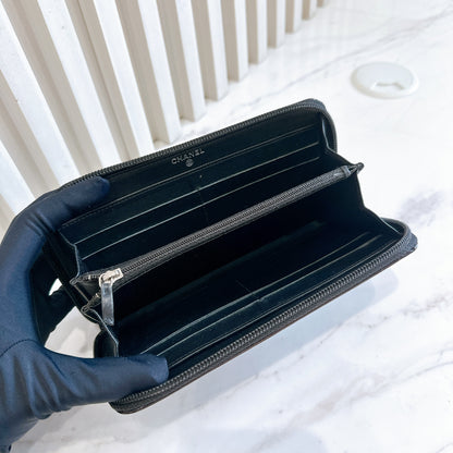 Chanel Patent Camellia Zippy Wallet