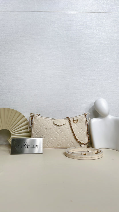LV Easy Pouch On Strap In Creme