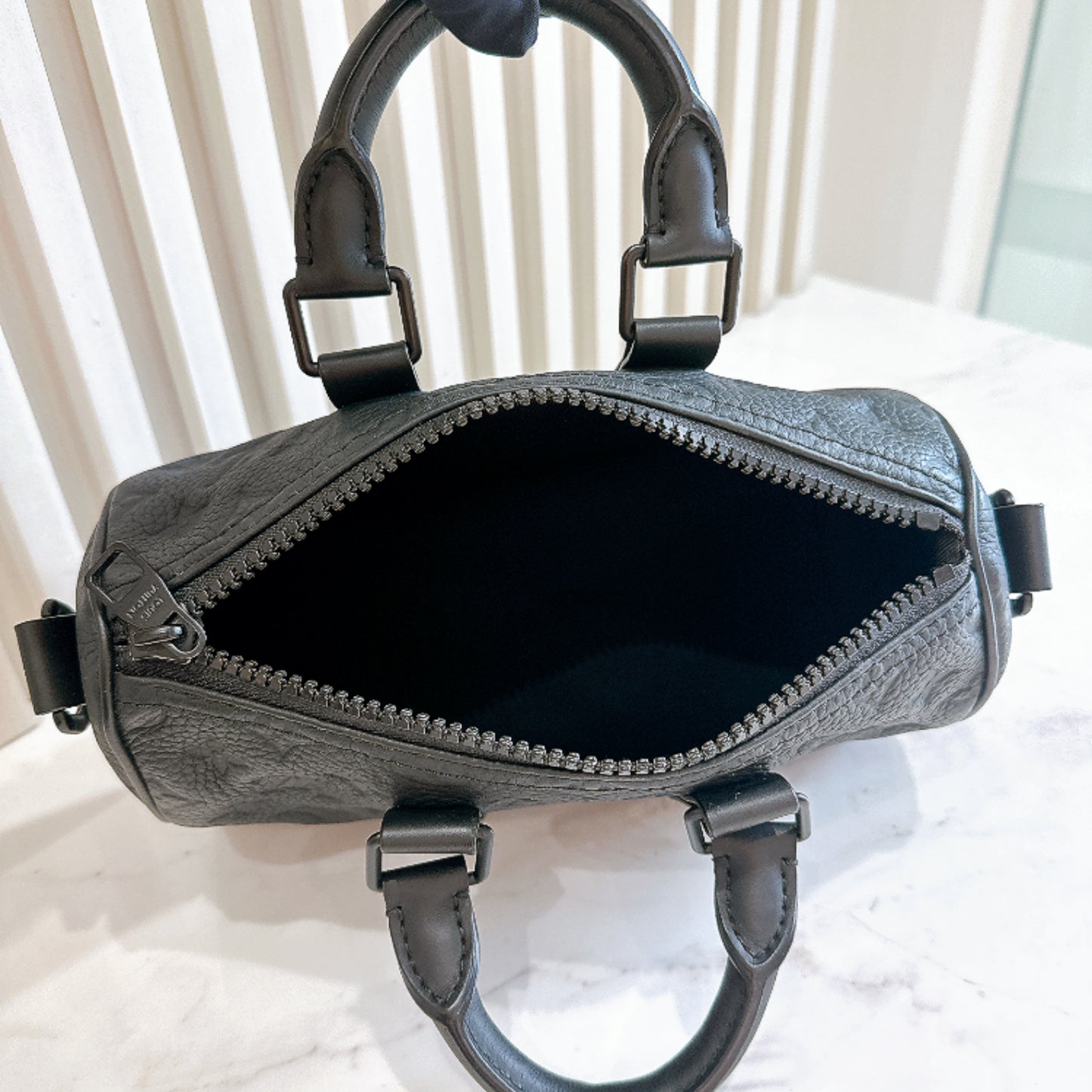 LV Keepall 25 in Black Taurillon
