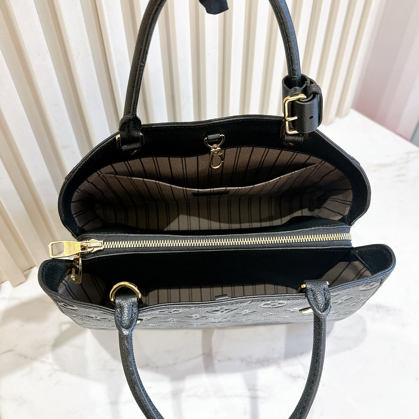 LV Montaigne MM in Black Empreinte Leather