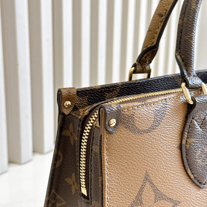LV On The Go East West Reverse Monogram