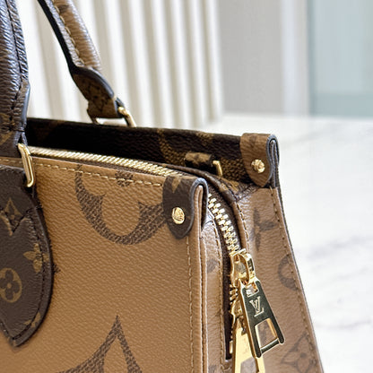 LV On The Go East West Reverse Monogram
